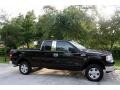 2004 Black Ford F150 STX SuperCab 4x4  photo #15