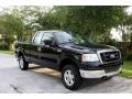 2004 Black Ford F150 STX SuperCab 4x4  photo #17