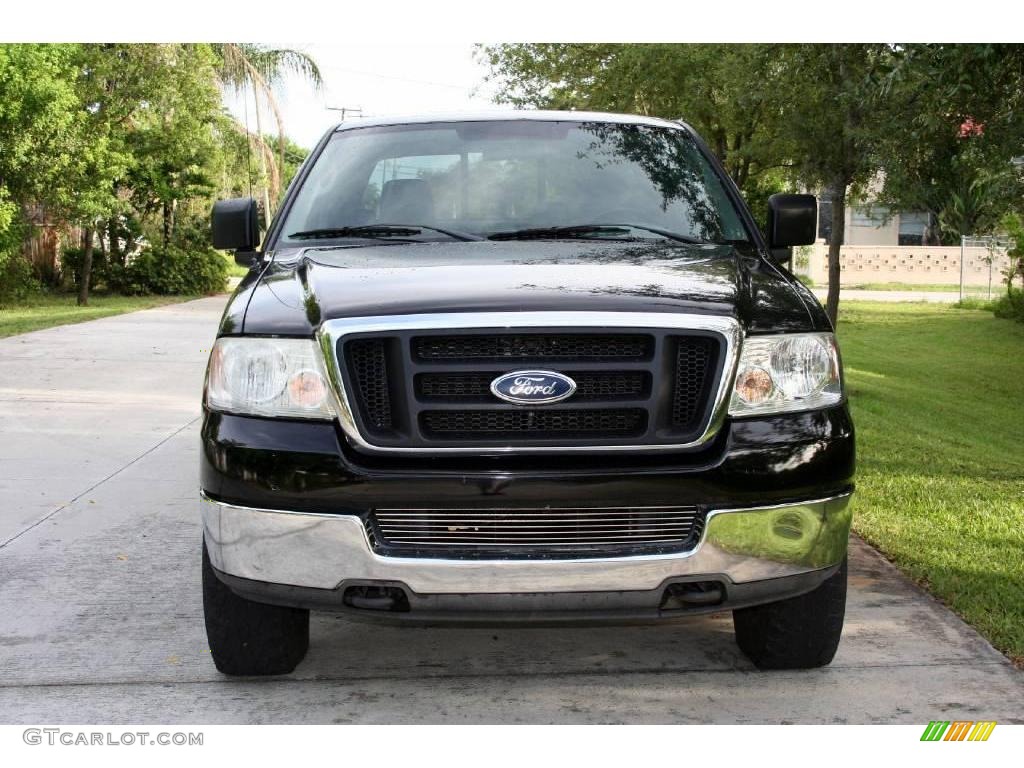 2004 F150 STX SuperCab 4x4 - Black / Medium Graphite photo #20