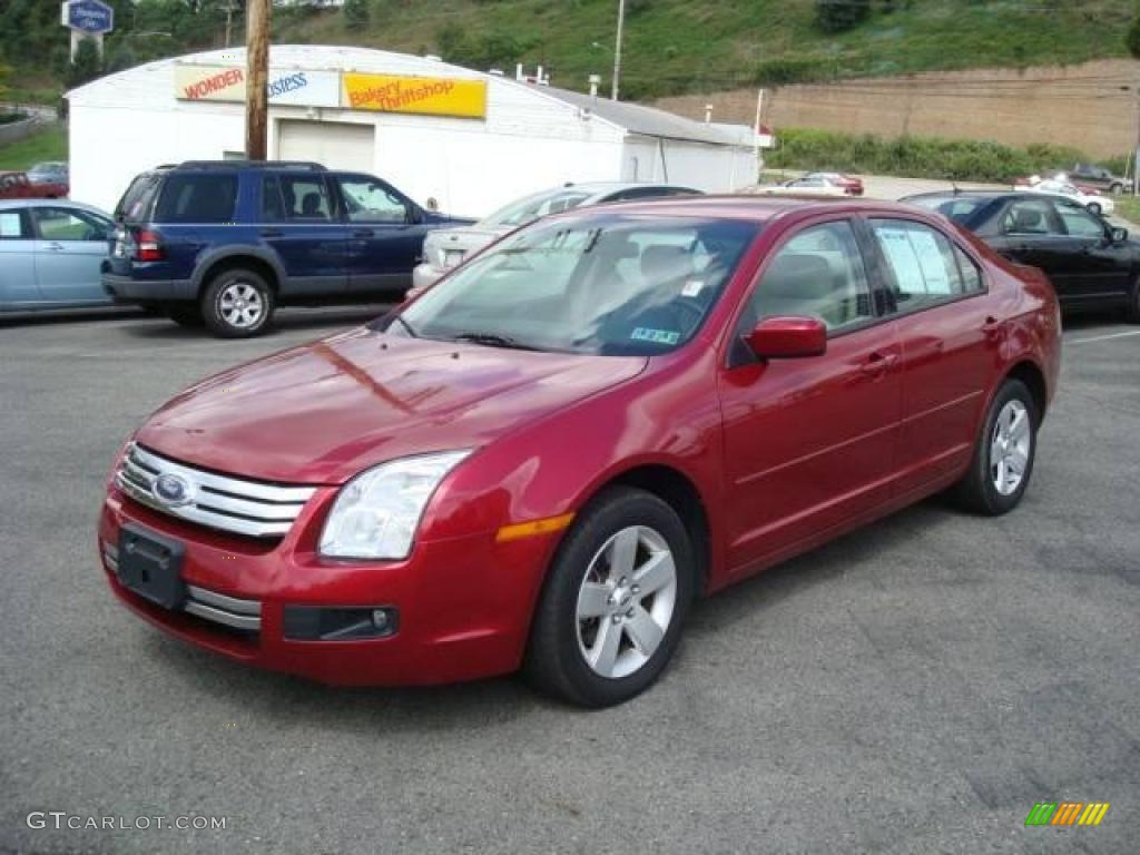 2007 Fusion SE V6 - Redfire Metallic / Light Stone photo #7