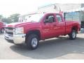 2009 Victory Red Chevrolet Silverado 2500HD Work Truck Extended Cab 4x4  photo #1