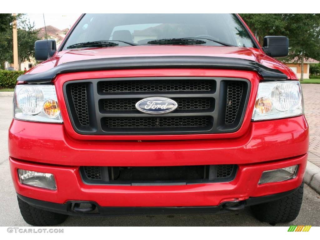 2004 F150 FX4 SuperCab 4x4 - Bright Red / Black/Medium Flint photo #21