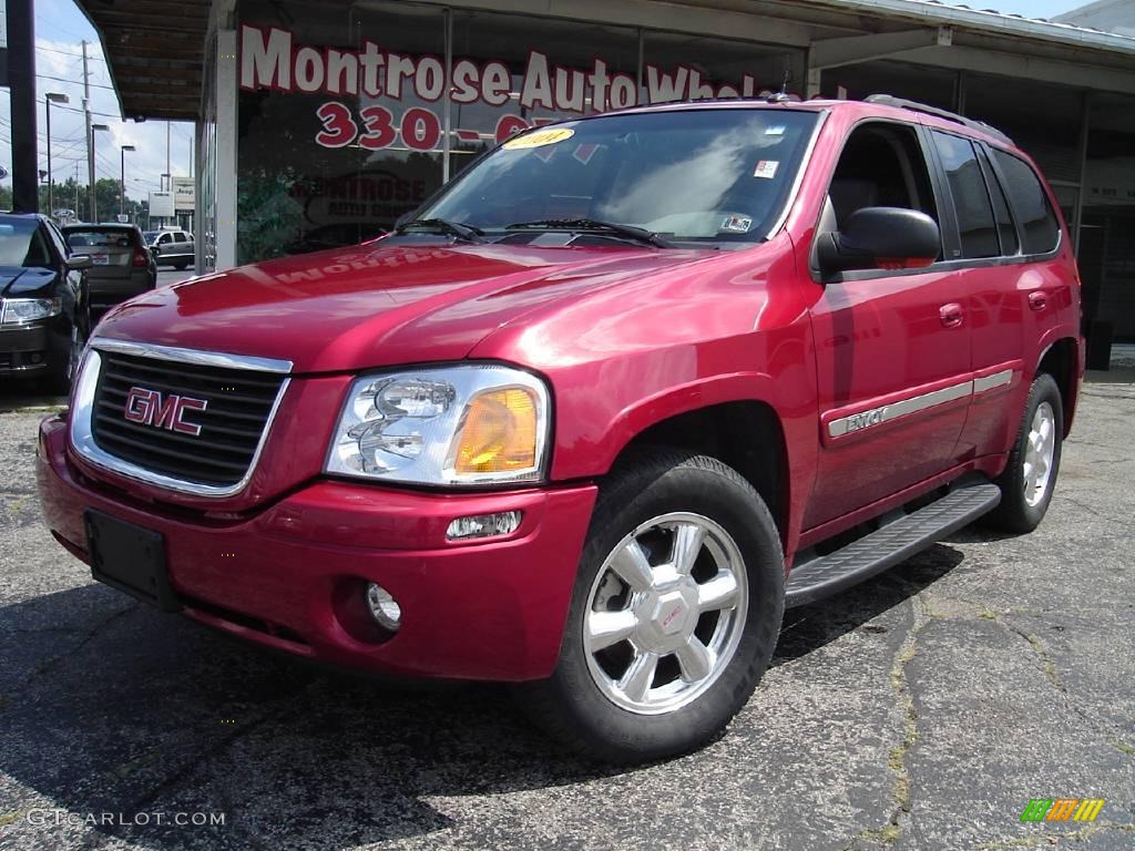 2004 Envoy SLE 4x4 - Magnetic Red Metallic / Medium Pewter photo #1