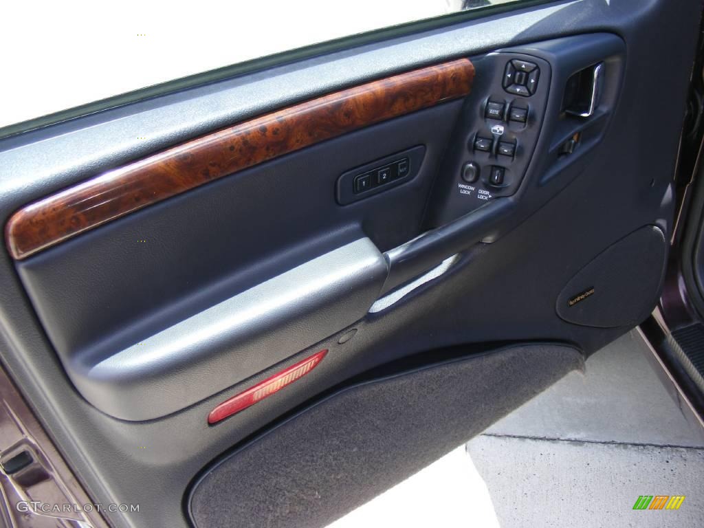 1997 Grand Cherokee Limited 4x4 - Dark Rosewood Pearl / Agate Black photo #28