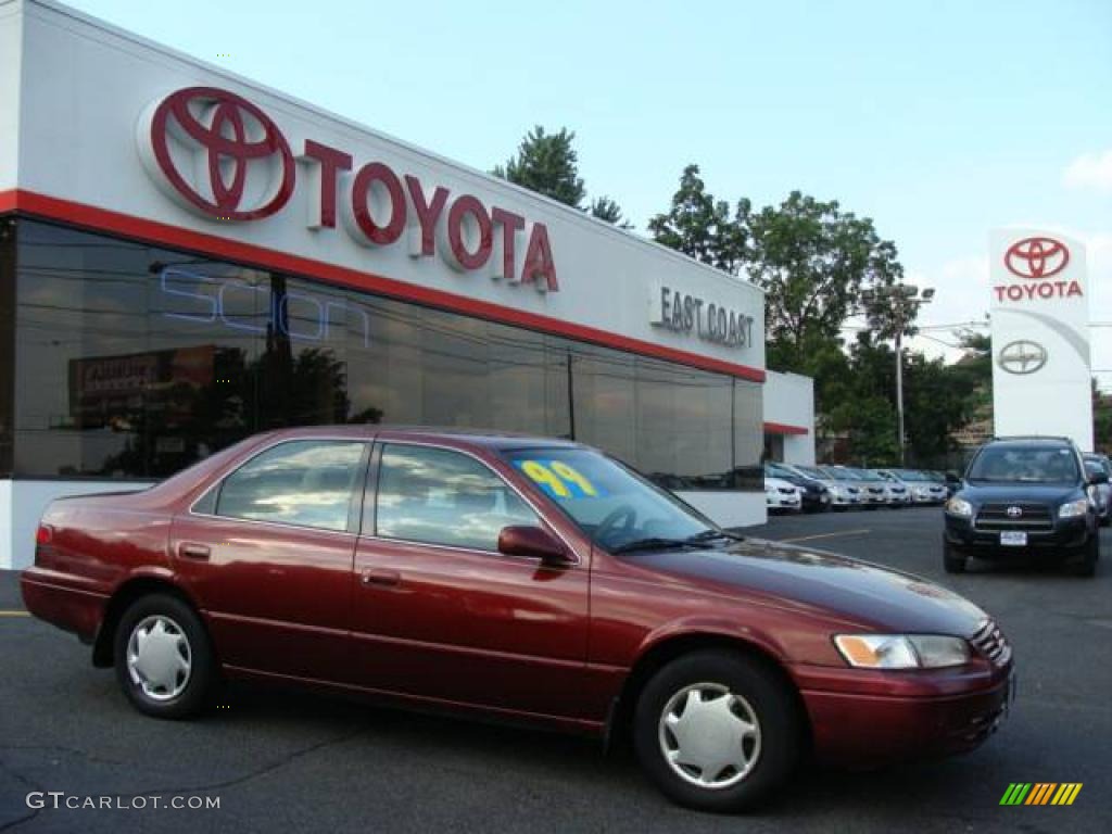 1999 Camry CE - Vintage Red Pearl / Oak photo #1