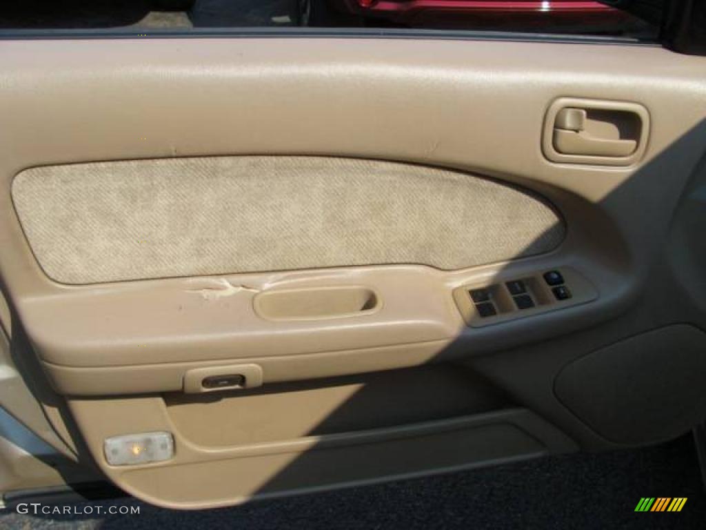 1998 Maxima GLE - Pebble Beige Metallic / Beige photo #7