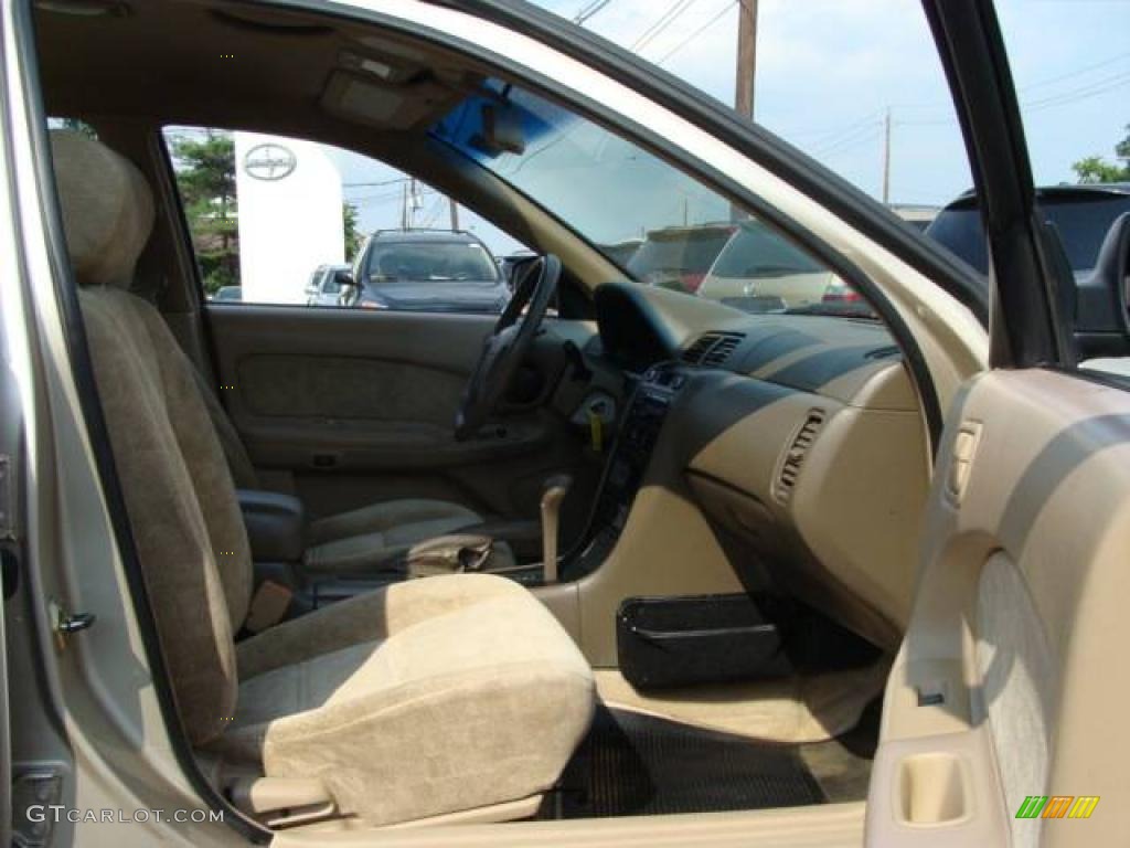 1998 Maxima GLE - Pebble Beige Metallic / Beige photo #9