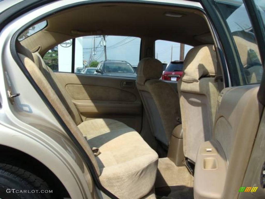 1998 Maxima GLE - Pebble Beige Metallic / Beige photo #13