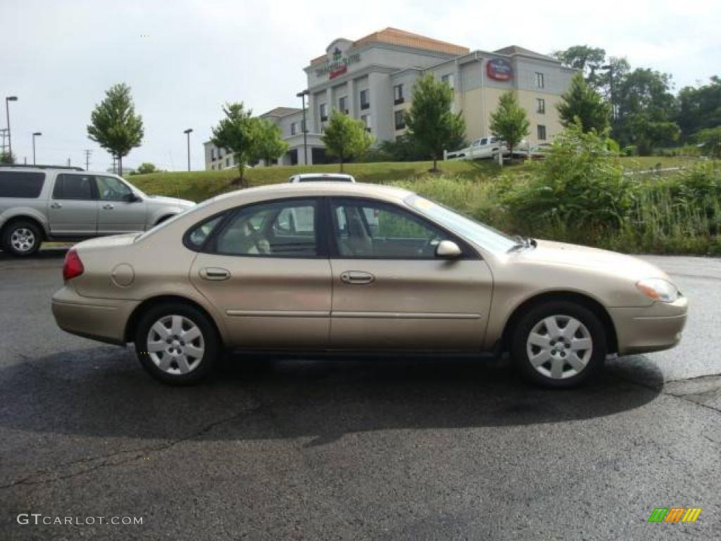 2000 Taurus SE - Harvest Gold Metallic / Medium Parchment photo #2