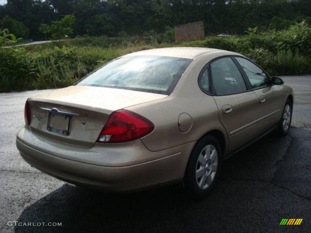 2000 Taurus SE - Harvest Gold Metallic / Medium Parchment photo #3