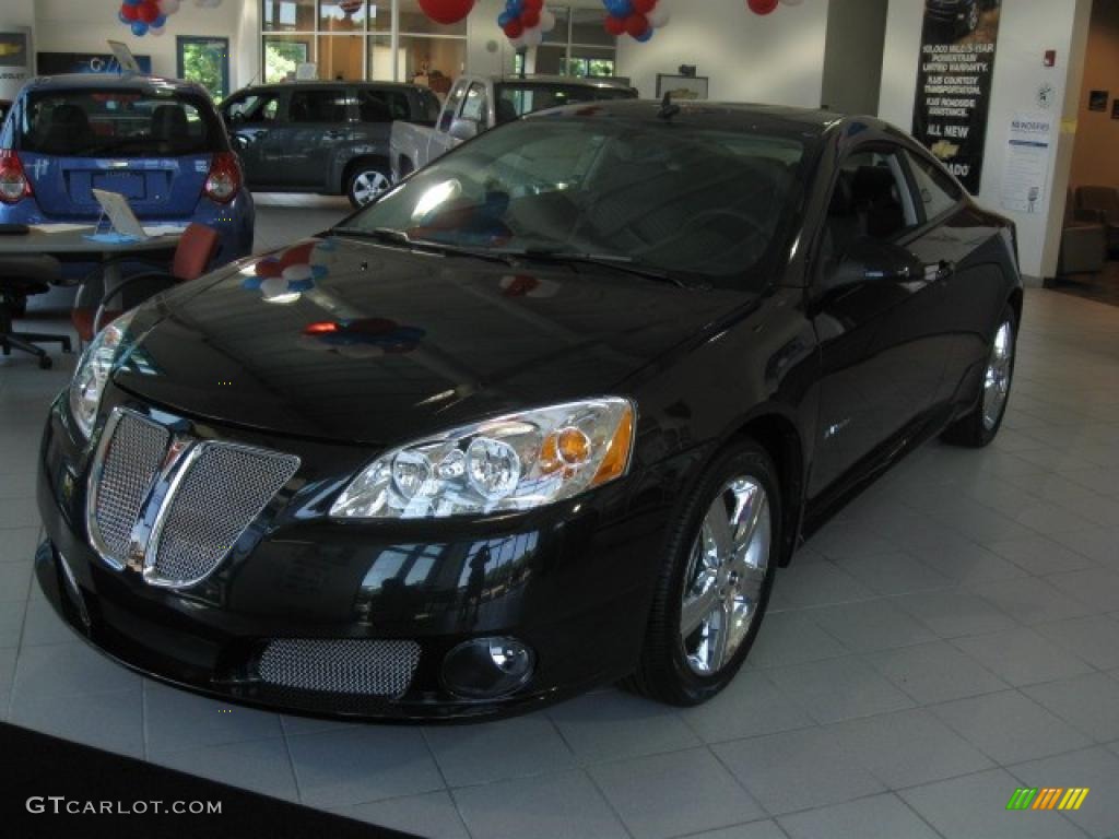 2009 G6 GXP Coupe - Carbon Black Metallic / Ebony photo #1