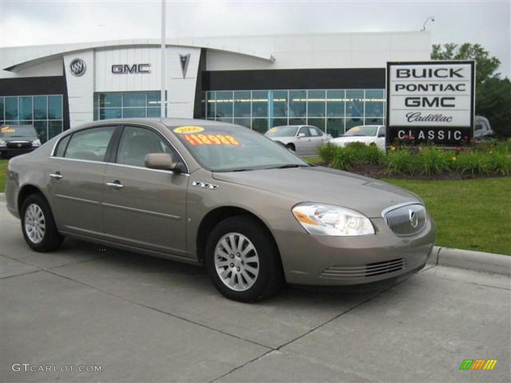 2006 Lucerne CX - Sandstone Metallic / Cashmere photo #1