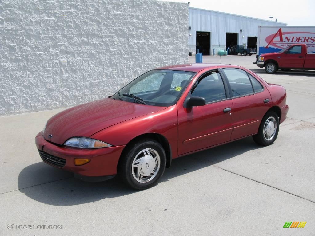 1997 Cavalier LS Sedan - Cayenne Red Metallic / Graphite photo #1