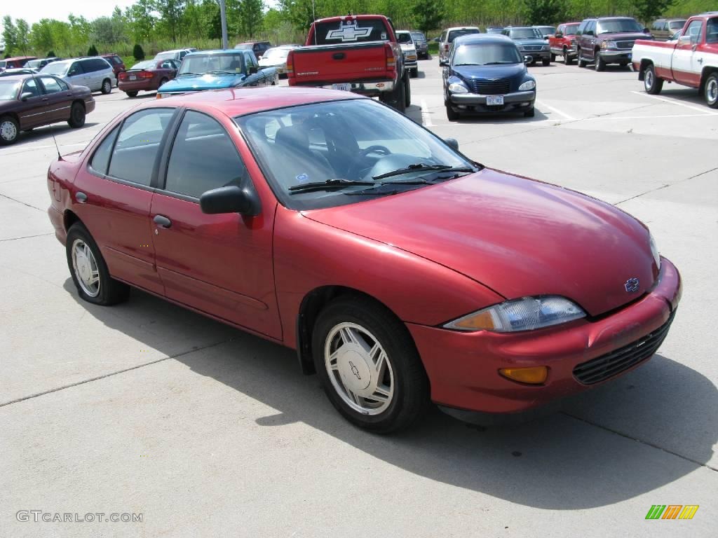 1997 Cavalier LS Sedan - Cayenne Red Metallic / Graphite photo #3