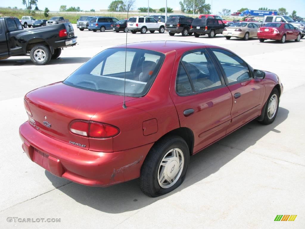 1997 Cavalier LS Sedan - Cayenne Red Metallic / Graphite photo #4