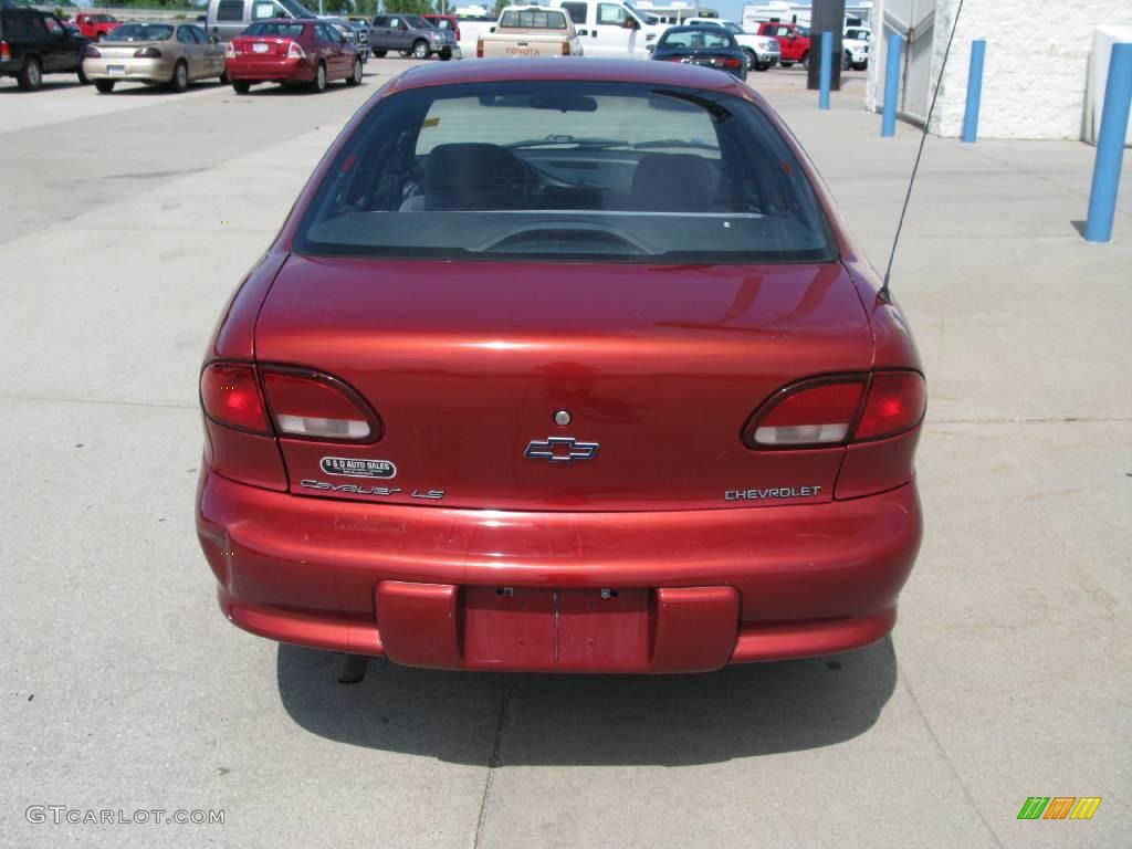 1997 Cavalier LS Sedan - Cayenne Red Metallic / Graphite photo #5