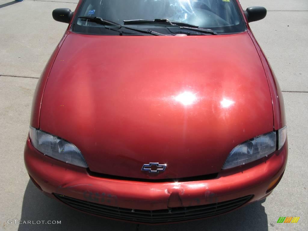 1997 Cavalier LS Sedan - Cayenne Red Metallic / Graphite photo #13