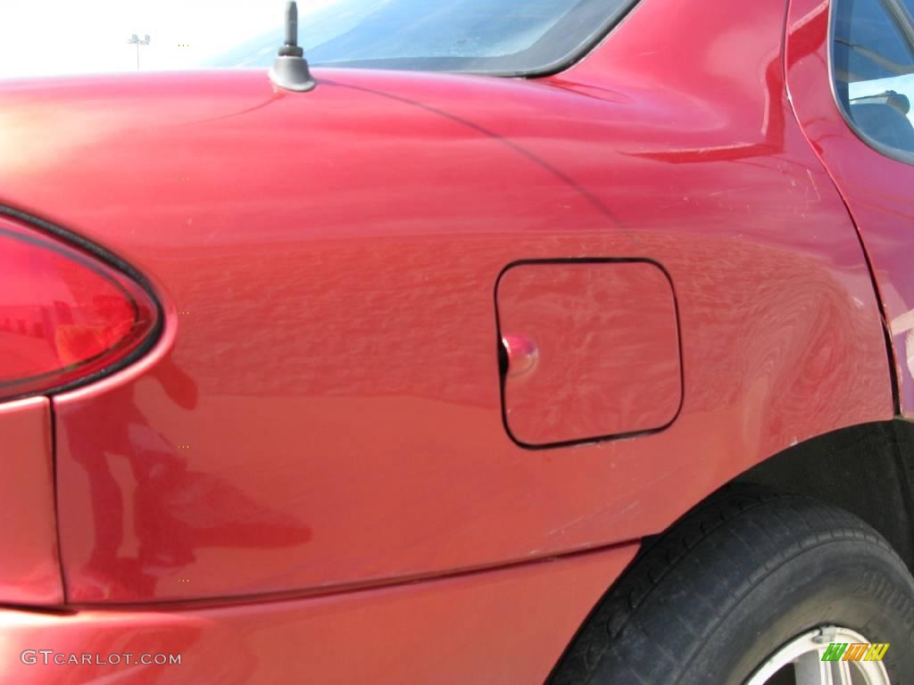 1997 Cavalier LS Sedan - Cayenne Red Metallic / Graphite photo #16