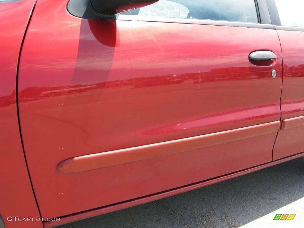 1997 Cavalier LS Sedan - Cayenne Red Metallic / Graphite photo #23
