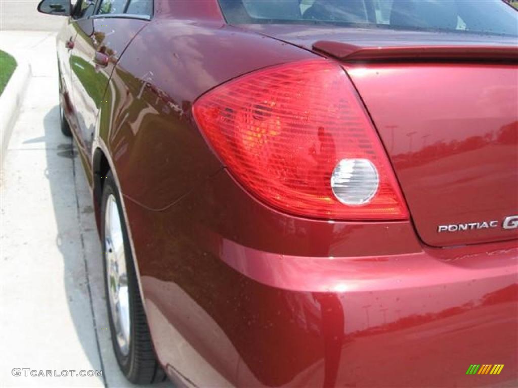 2009 G6 GXP Sedan - Performance Red Metallic / Ebony photo #6