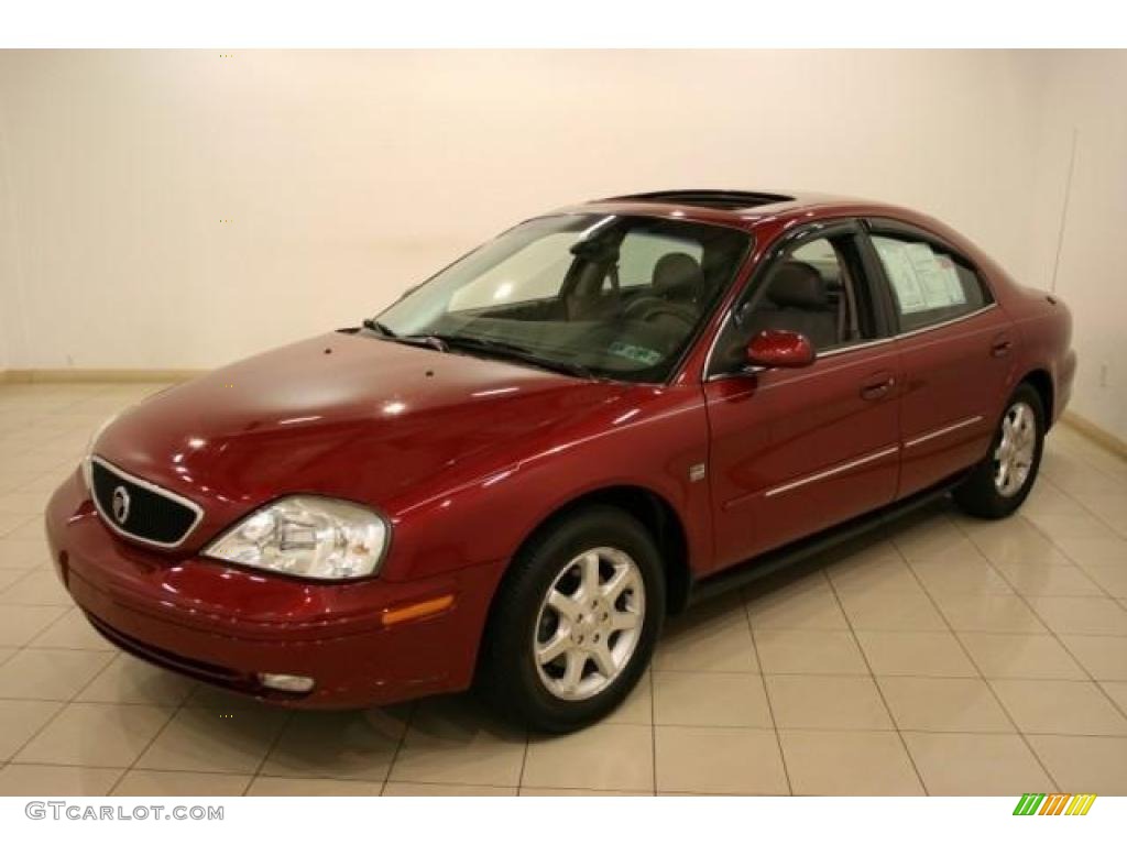 2002 Sable LS Premium Sedan - Matador Red Metallic / Medium Graphite photo #3