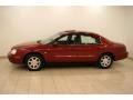 2002 Matador Red Metallic Mercury Sable LS Premium Sedan  photo #4