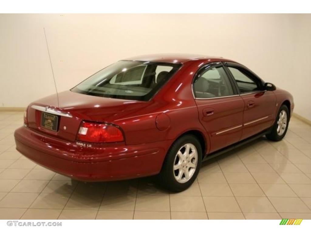 2002 Sable LS Premium Sedan - Matador Red Metallic / Medium Graphite photo #7