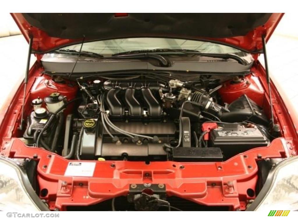 2002 Sable LS Premium Sedan - Matador Red Metallic / Medium Graphite photo #19