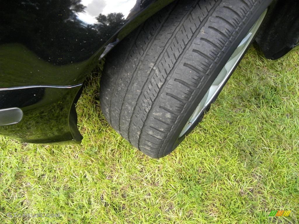 2003 3 Series 325i Sedan - Jet Black / Sand photo #18