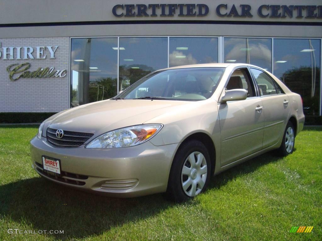 2004 Camry LE - Desert Sand Mica / Taupe photo #1