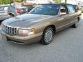 1998 Gold Fire Mist Metallic Cadillac DeVille Sedan  photo #1