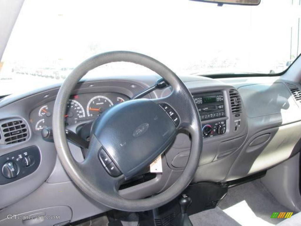 1999 F150 XLT Extended Cab 4x4 - Woodland Green Metallic / Medium Graphite photo #12