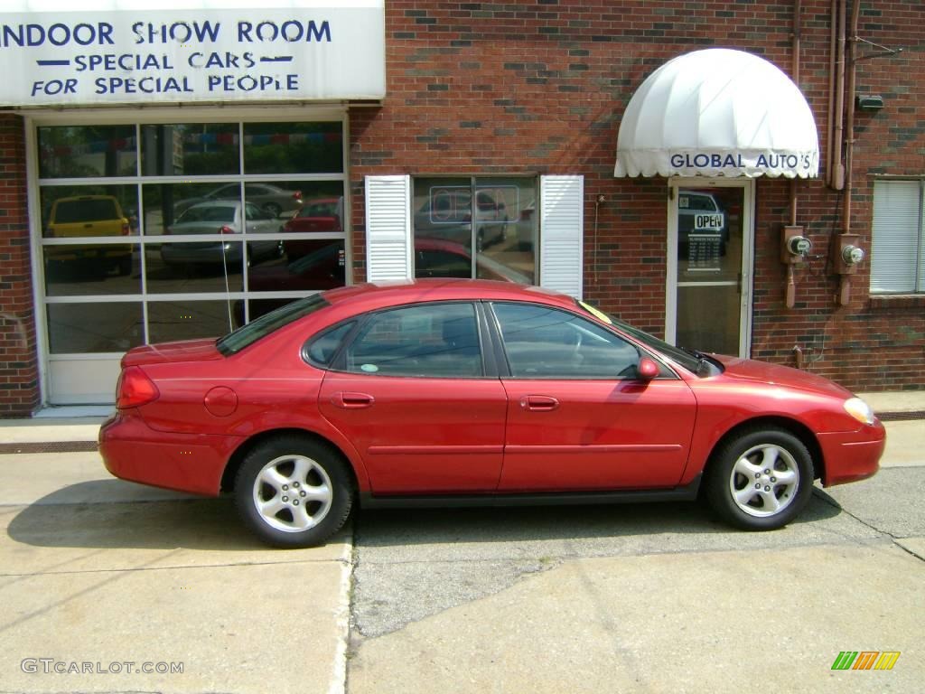 2001 Taurus SES - Toreador Red Metallic / Dark Charcoal photo #1