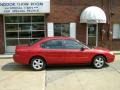 2001 Toreador Red Metallic Ford Taurus SES  photo #1