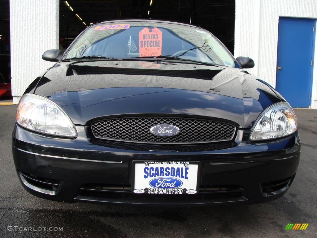 2004 Taurus SE Sedan - Black / Medium Parchment photo #2