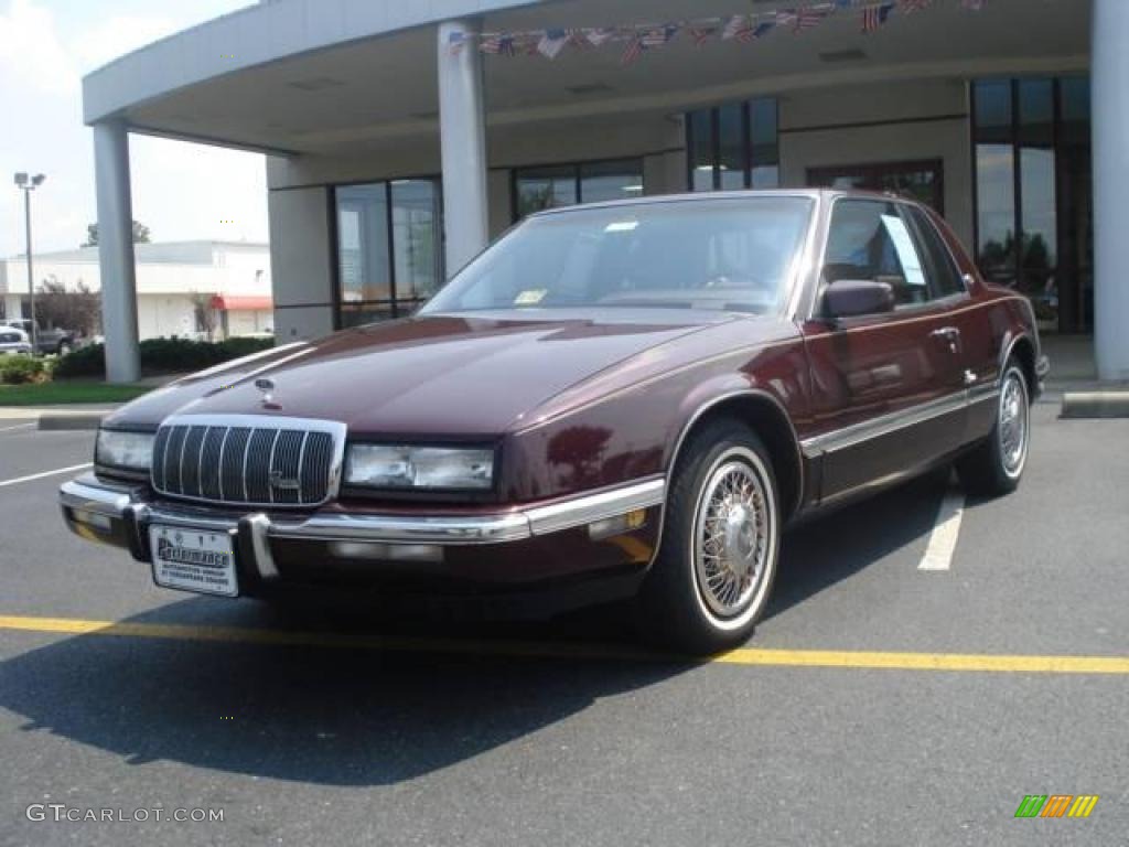 Dark Maple Red Metallic Buick Riviera