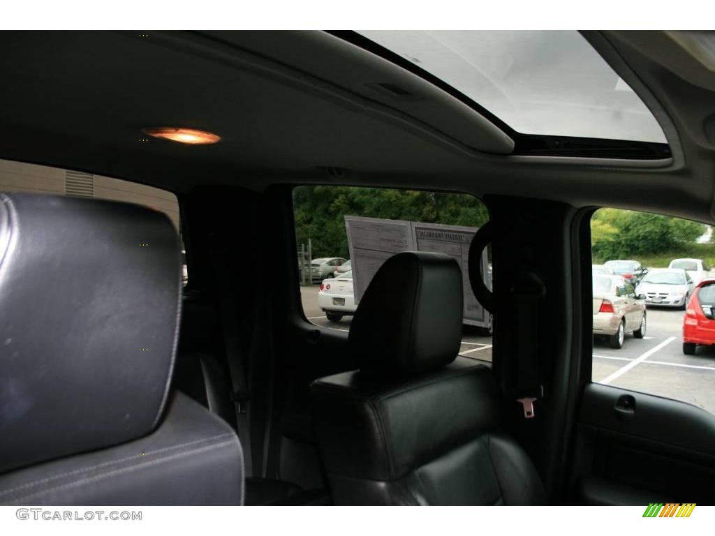 2005 F150 Lariat SuperCrew - Dark Toreador Red Metallic / Black photo #25