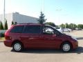 2009 Salsa Red Pearl Toyota Sienna LE  photo #6