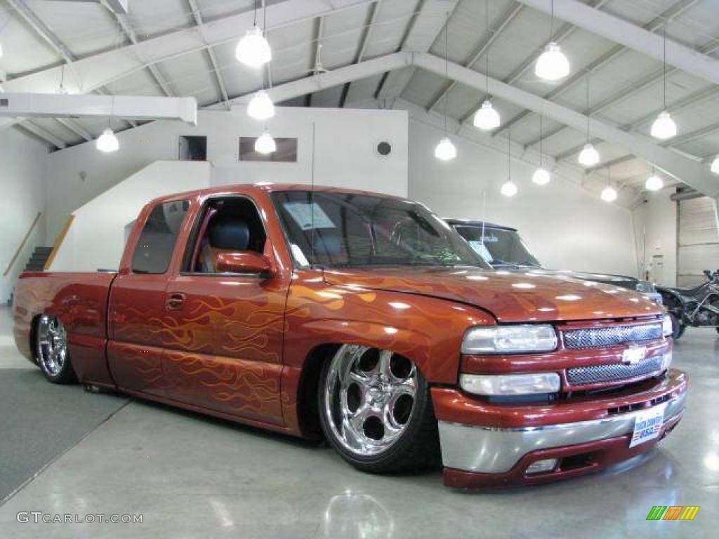 2001 Silverado 1500 LS Extended Cab 4x4 - Sunset Orange Metallic / Graphite photo #4