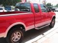 1997 Bright Red Ford F150 Lariat Extended Cab 4x4  photo #30