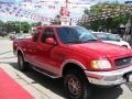 1997 Bright Red Ford F150 Lariat Extended Cab 4x4  photo #32