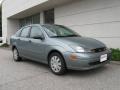 2004 Light Tundra Metallic Ford Focus SE Sedan  photo #1