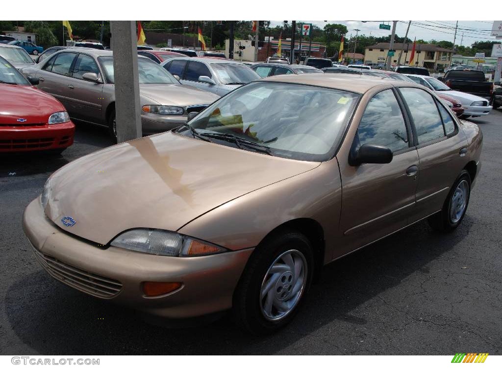 1999 Cavalier Sedan - Medium Sunset Gold Metallic / Graphite photo #2