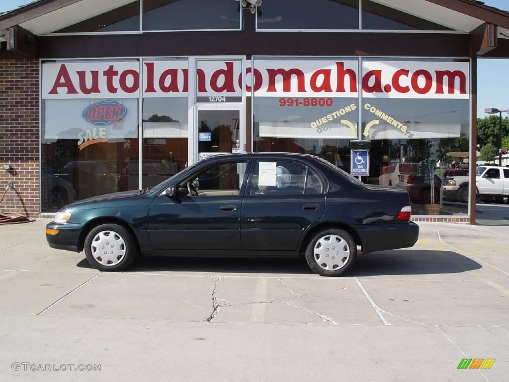 1997 Corolla CE - Dark Emerald Pearl Green Metallic / Beige photo #1