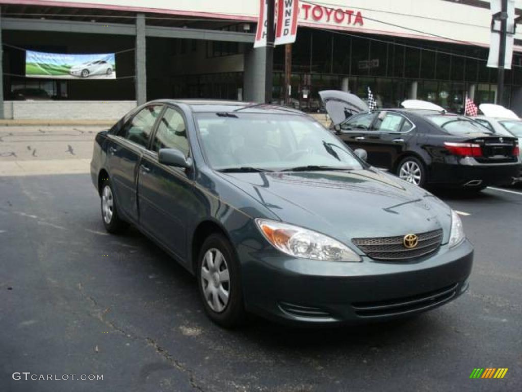 2004 Camry LE - Aspen Green Pearl / Stone photo #6