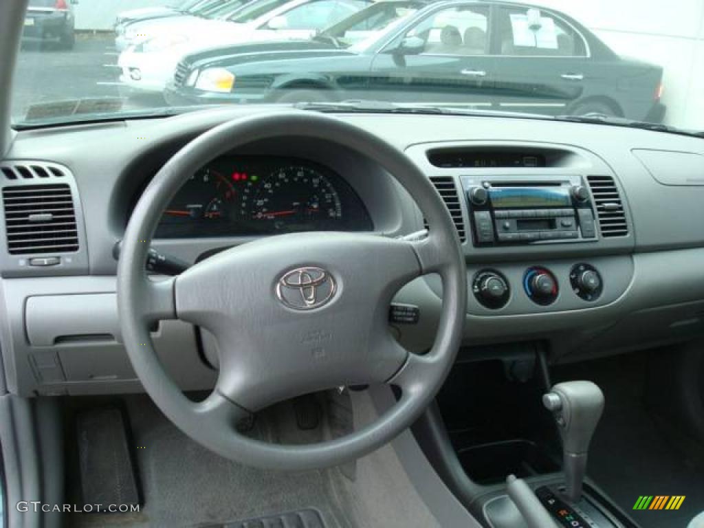 2004 Camry LE - Aspen Green Pearl / Stone photo #12