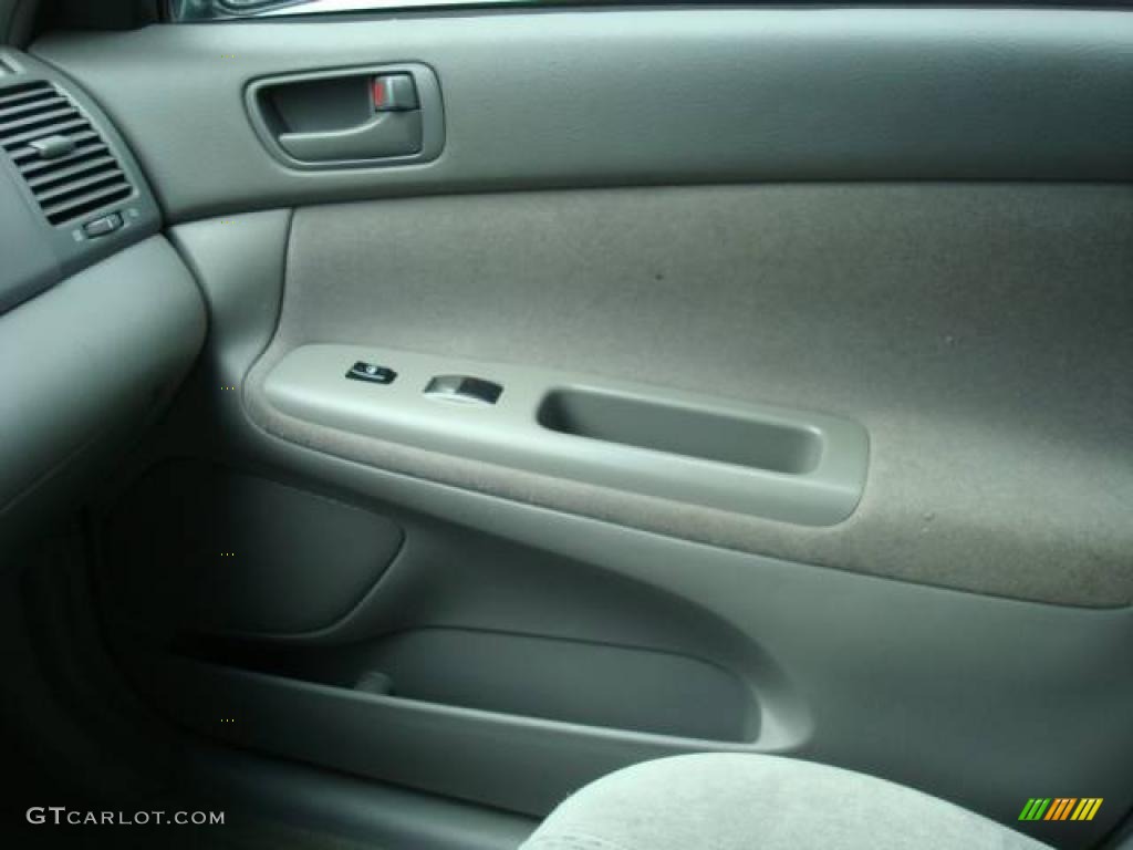 2004 Camry LE - Aspen Green Pearl / Stone photo #17