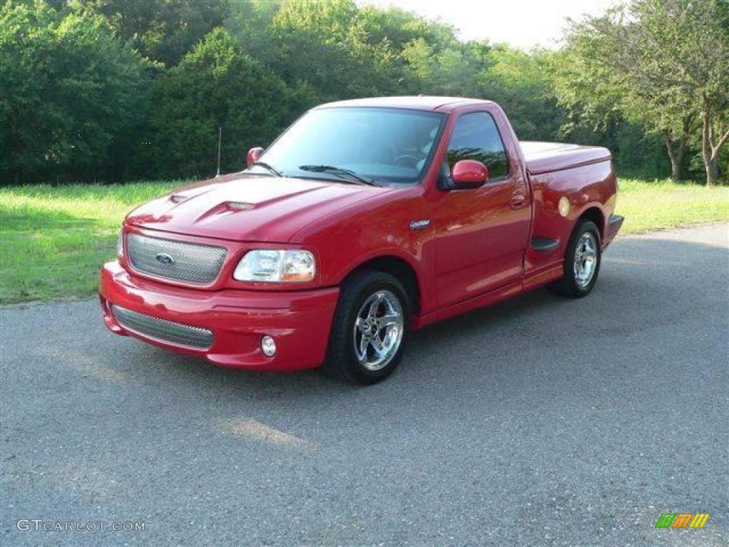 2004 F150 SVT Lightning - Bright Red / SVT Black/Light Flint photo #4