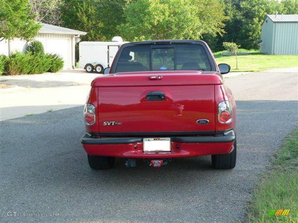 2004 F150 SVT Lightning - Bright Red / SVT Black/Light Flint photo #5