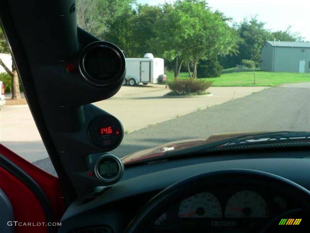 2004 F150 SVT Lightning - Bright Red / SVT Black/Light Flint photo #9